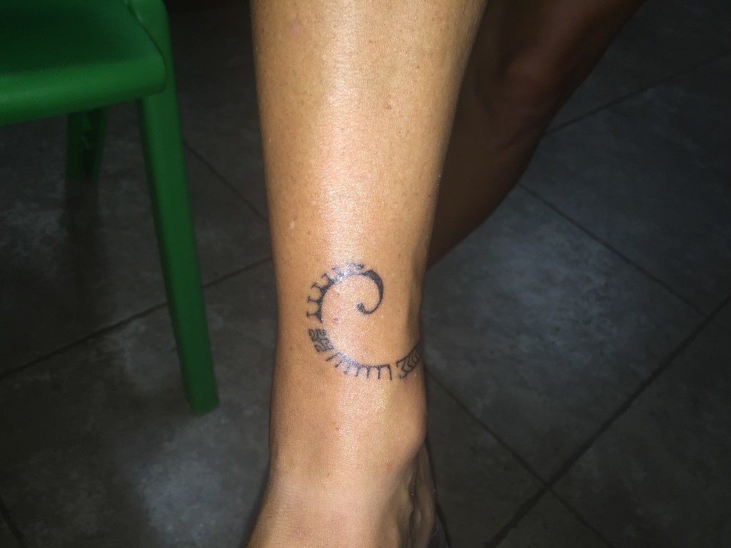 Karen's Tattoo - Design wraps around to her ankle