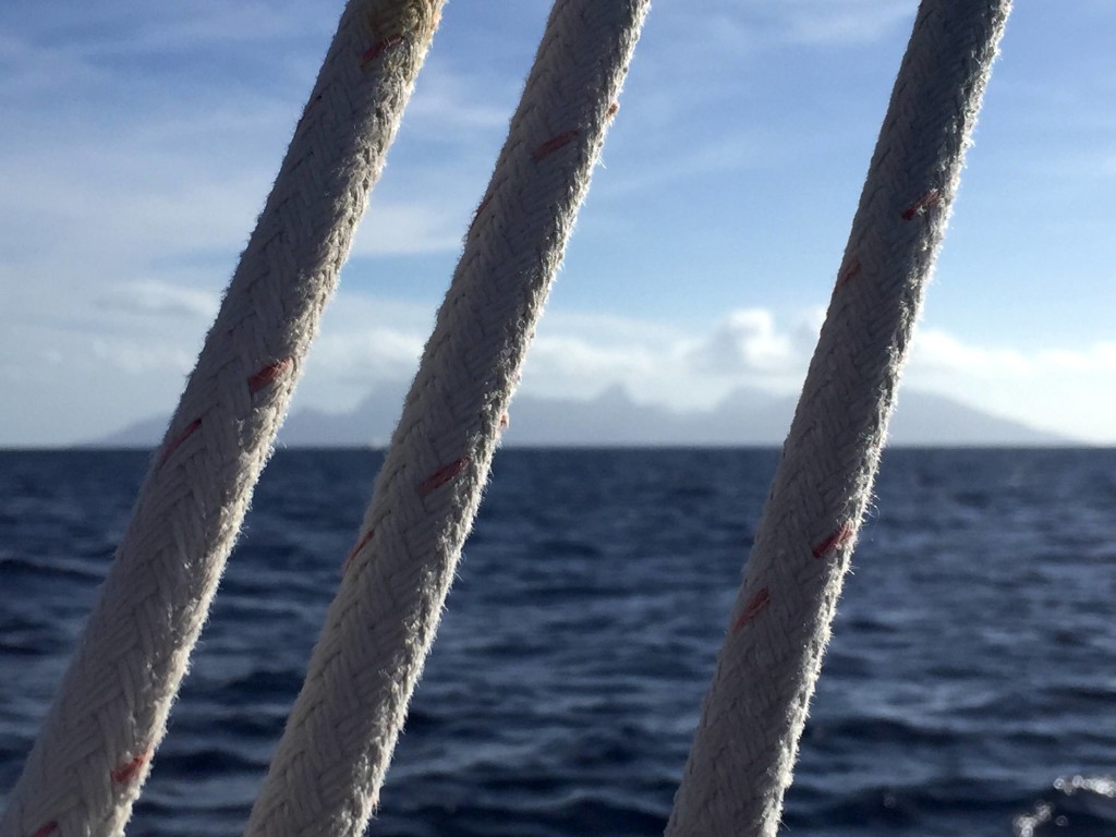 Tahiti Rearview - The island is silhouetted in the distance as we sail NNE toward the equator