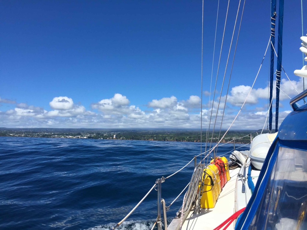 Approaching Hilo - Batu motors the last couple of miles as the wind backs off entering Hilo Bay